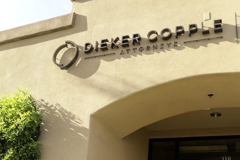 The entrance to the firm's Scottsdale office, with the firm's sign above the door